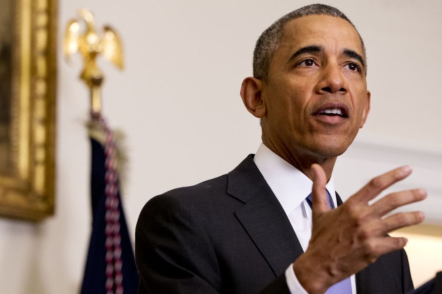 President Barack Obama speaks about the release of Americans by Iran, Sunday, Jan. 17, 2016, in the Cabinet Room of the White House in Washington. (AP Photo/Jacquelyn Martin)