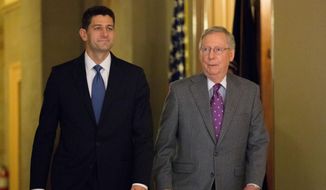 House Speaker Paul Ryan of Wis., left, and Senate Majority Leader Mitch McConnell of Ky. walk in the U.S. Capitol  in Washington. (AP Photo/Andrew Harnik, File)