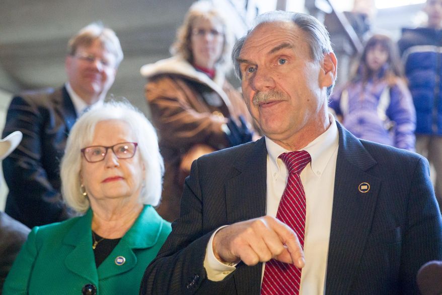 State Rep. Mark Pody, R-Lebanon, speaks at a rally at the state Capitol in Nashville, Tenn., on Tuesday, Jan. 19, 2016, in support of his proposal to exclude Tennessee from the U.S. Supreme Court's gay marriage ruling. Pody said he was undeterred by a projected loss of $8.5 billion in federal funds if the Legislature enacts the measure. At left is state Sen. Mae Beavers, R-Mt. Juliet. (AP Photo/Erik Schelzig)