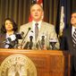 Louisiana Gov. John Bel Edwards, center, unveils his proposals for balancing Louisiana&#39;s budget, including a list of tax increases for legislative consideration, during a news conference, Tuesday, Jan. 19, 2016, in Baton Rouge, La. Joining Edwards are Revenue Secretary Kimberly Robinson, left, and Commissioner of Administration Jay Dardenne. (AP Photo/Melinda Deslatte)