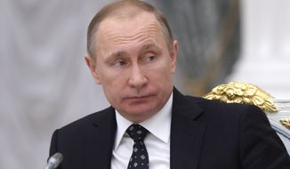 A British government inquiry concluded Thursday that Russian President Vladimir Putin &quot;probably&quot; ordered the poisoning of a rogue spy in the heart of London nearly a decade ago. (Associated Press)