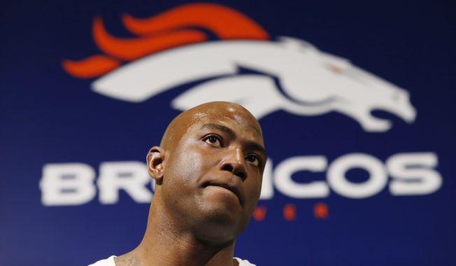 Denver Broncos outside linebacker DeMarcus Ware listens to question during news conference following the team&#x27;s NFL football practice, Wednesday, Jan. 20, 2016, at the team&#x27;s headquarters in Englewood, Colo. The Broncos will host the New England Patriots in the AFC Championship Sunday in Denver. (AP Photo/David Zalubowski)