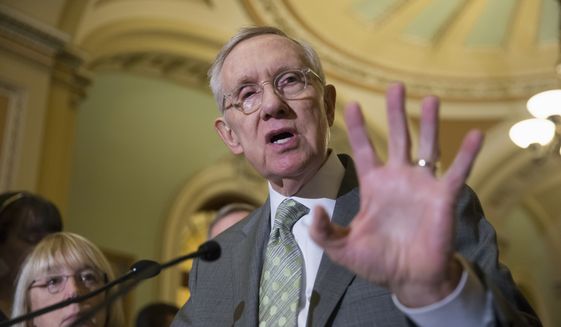 Senate Minority Leader Harry Reid of Nev., joined by Sen. Patty Murray, D-Wash., speaks with reporters on Capitol Hill in Washington, Wednesday, Jan. 20, 2016, before Democrats blocked legislation from the GOP-led House on a bill that would crack down on Syrian and Iraqi refugees entering America. (Associated Press) **FILE**