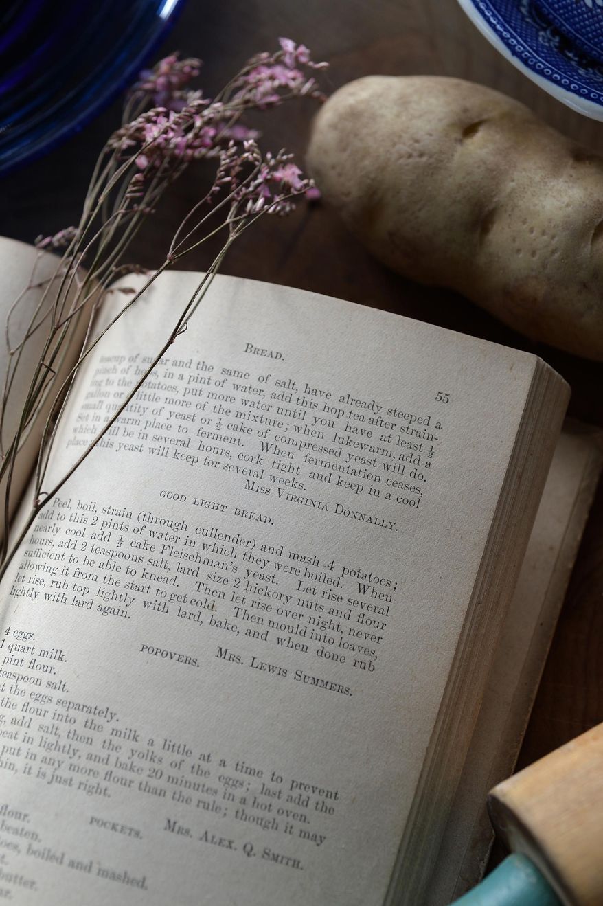 ADVANCE FOR MONDAY JAN. 25 AND THEREAFTER - This Jan. 13, 2016 photo shows a cookbook in Charleston, W.Va., found by Connie Looney in a box of cookbooks that she bought for $2 at the Mountaineers Auctions in Clendenin, W.Va. The cookbook was published in 1892 by the Ladies of Charleston, W.Va. to raise money for the “Home for the Destitute.” (Kenny Kemp/Charleston Gazette-Mail via AP) MANDATORY CREDIT
