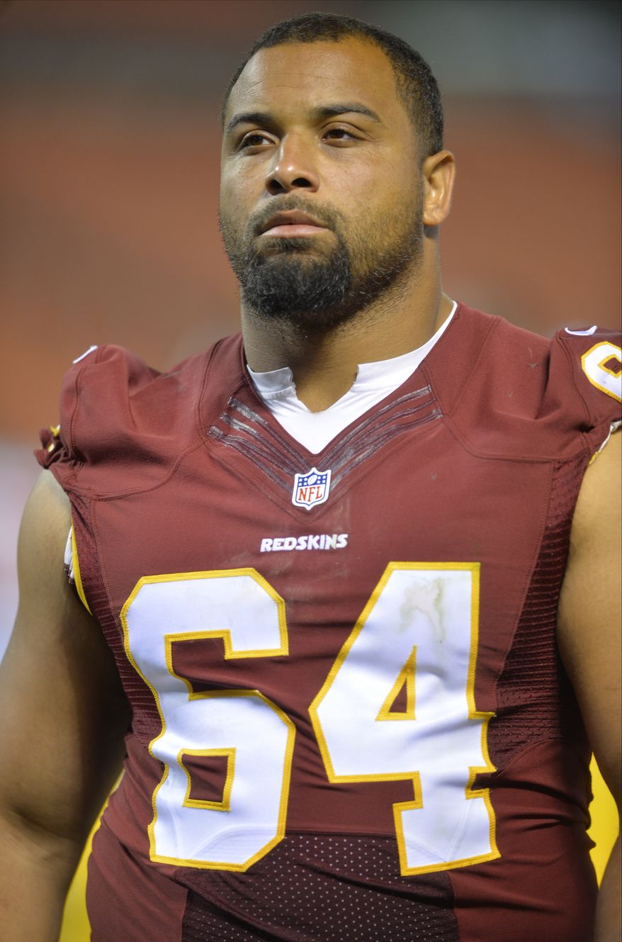 Washington Redskins defensive end Kedric Golston walks off the field after the Redskins defeated the Cleveland Browns 20-17 in an NFL preseason football game Thursday, Aug. 13, 2015, in Cleveland. (AP Photo/David Richard)