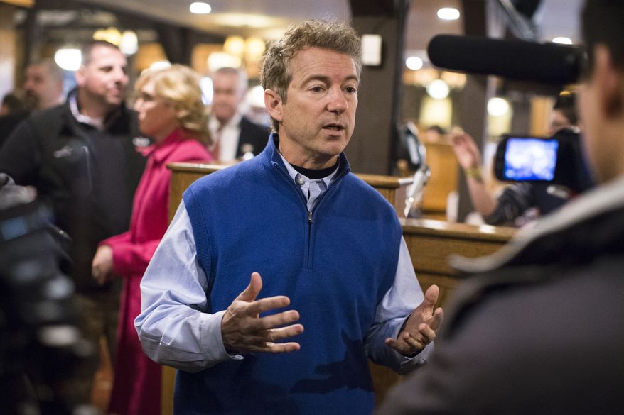 Republican presidential candidate, Sen. Rand Paul, R-Ky, answers an interview question during a campaign stop at the Puritan Backroom restaurant, Friday, Jan. 22, 2016, in Manchester. (AP Photo/John Minchillo)