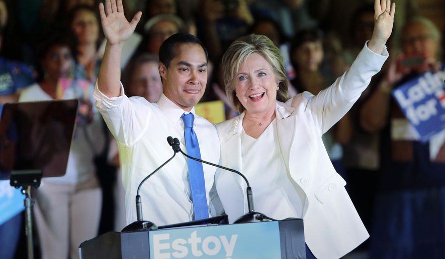 In this Oct. 15, 2015, file photo, Democratic presidential candidate Hillary Clinton, right, stands with Housing and Urban Development Secretary Julian Castro, left, after she was introduced during a campaign event in San Antonio. Clinton hasn&#39;t just been wrapping herself in President Barack Obama&#39;s legacy lately. She&#39;s been wrapping herself in his Cabinet. (AP Photo/Eric Gay, File)