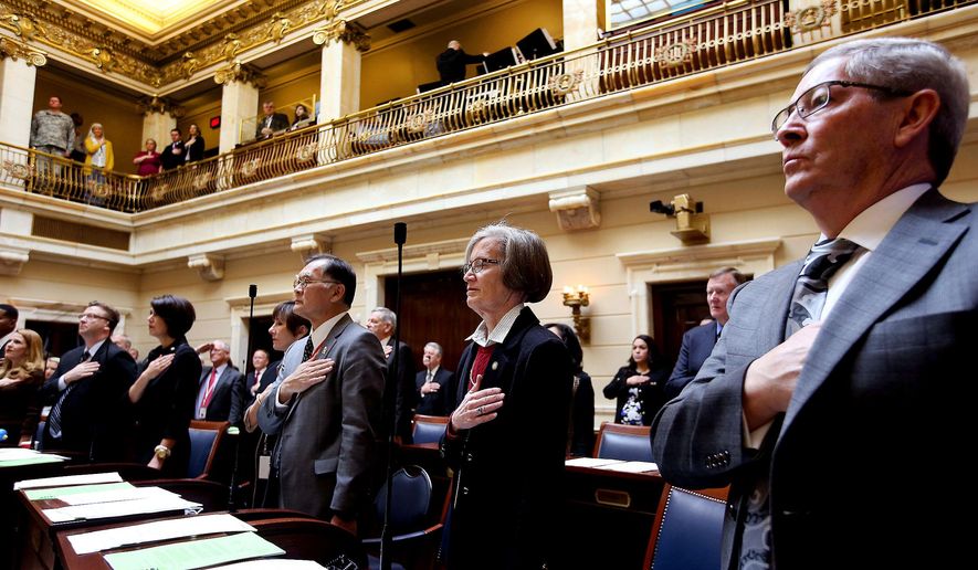 Senators stand during the national anthem on the first day of the Utah Legislature at the Capitol in Salt Lake City on Monday, Jan. 25, 2016. (Laura Seitz/The Deseret News via AP) SALT LAKE TRIBUNE OUT; MAGAZINES OUT; MANDATORY CREDIT; TV OUT