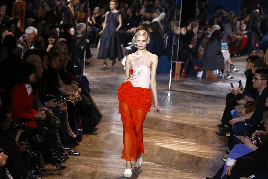 A model wears a creation as part of Christian Dior's Spring- Summer 2016 Haute Couture fashion collection presented in Paris, Monday, Jan.25, 2016. (AP Photo/Francois Mori)