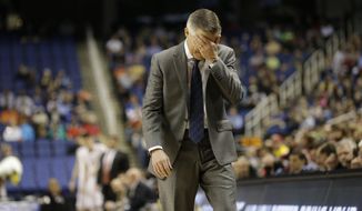 FILE - In this March 10, 2015, file photo, Georgia Tech head coach Brian Gregory reacts after a turnover during the first half of an NCAA college basketball game against Boston College in the first round of the Atlantic Coast Conference tournament in Greensboro, N.C. The Yellow Jackets play in the Atlantic Coast Conference. They have a marvelous new arena. They&#39;re in the midst of a stellar recruiting base. Yet, they haven&#39;t been to the NCAA tournament since 2010, haven&#39;t been much of a factor since reaching the national championship game a dozen years ago, and now comes a 1-5 start in the ACC.  (AP Photo/Gerry Broome, File)