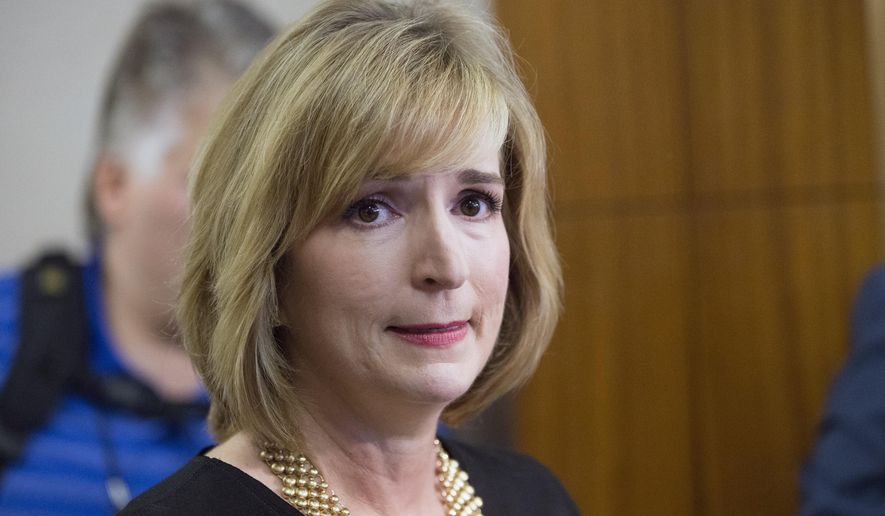 FILE - In this Aug. 10, 2015 file photo, Harris County District Attorney Devon Anderson speaks in Houston, Texas. Anderson Monday, Jan. 25, 2016, announced a grand jury has indicted two anti-abortion activists who made undercover videos alleging Planned Parenthood illegally sold fetal tissue to researchers for a profit, and said the abortion provider committed no wrong. (AP Photo/David J. Phillip, File)