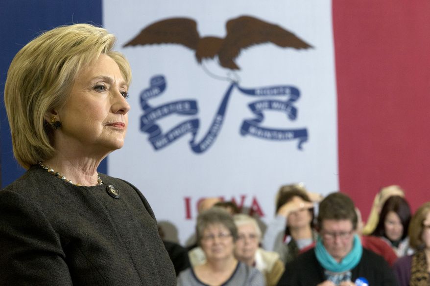 Democratic presidential candidate Hillary Clinton takes a question from a member of the audience during a campaign event at the Knoxville School District Administration Office, Monday, Jan. 25, 2016, in Knoxville, Iowa. (AP Photo/Mary Altaffer)