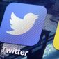 This Friday, Oct. 18, 2013, file photo, shows a Twitter app on an iPhone screen, in New York. (AP Photo/Richard Drew, File)