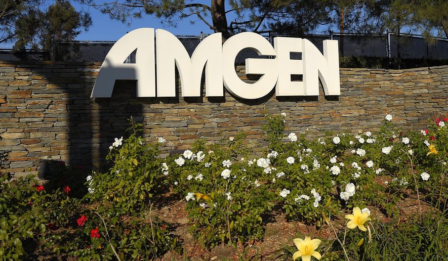 FILE - This Nov. 9, 2014, file photo, shows signage outside the Amgen headquarters in Thousand Oaks, Calif. Amgen Inc. reports financial results on Thursday, Jan. 28, 2016. (AP Photo/Mark J. Terrill, File)