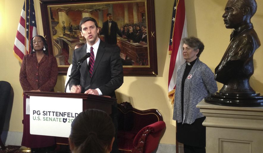 Democratic U.S. Senate candidate P.G. Sittenfeld and gun control advocates discuss the launch of a ballot effort that would restore control over guns to Ohio cities during a news conference in the Ohio Statehouse on Thursday, Jan. 28, 2016 in Columbus, Ohio. Sittenfeld, a Cincinnati city councilman, announced Thursday, that he's joining forces with gun control groups to push an amendment to Ohio's Constitution as soon as this fall that would to restore home-rule rights to cities so they can pass and enforce their own gun laws. (AP Photo/Julie Carr Smyth)