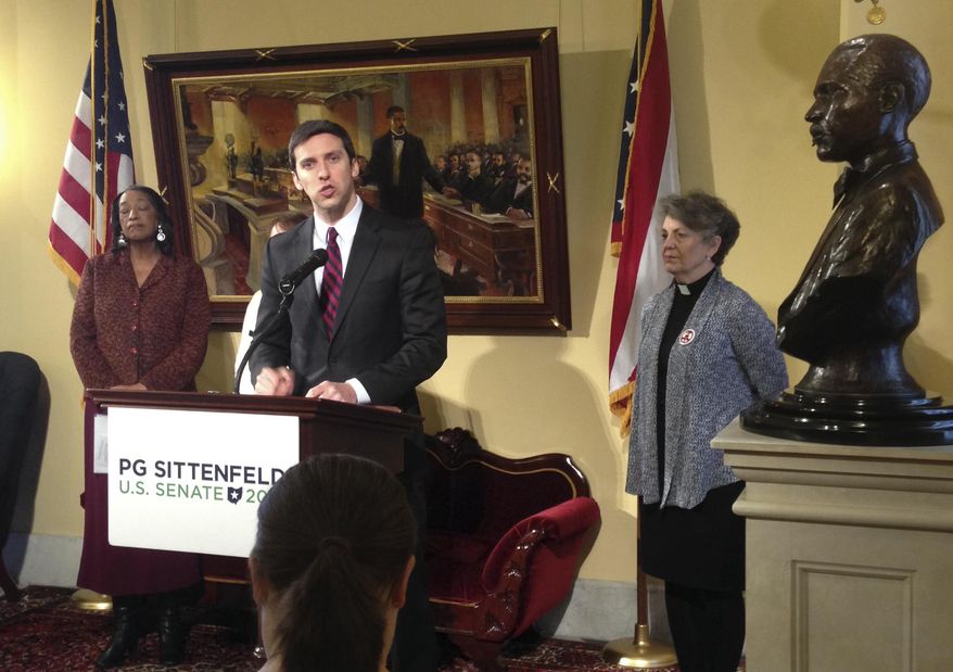 Democratic U.S. Senate candidate P.G. Sittenfeld and gun control advocates discuss the launch of a ballot effort that would restore control over guns to Ohio cities during a news conference in the Ohio Statehouse on Thursday, Jan. 28, 2016 in Columbus, Ohio. Sittenfeld, a Cincinnati city councilman, announced Thursday, that he's joining forces with gun control groups to push an amendment to Ohio's Constitution as soon as this fall that would to restore home-rule rights to cities so they can pass and enforce their own gun laws. (AP Photo/Julie Carr Smyth)