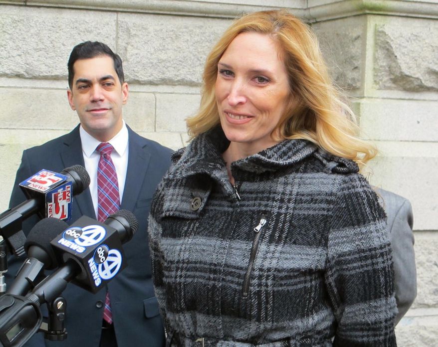 Kimberly Billups, one of three plaintiffs who have filed a federal lawsuit challenging a Charleston, S.C., city ordinance that tour guides must pass oral and written tests, speaks at a news conference outside the federal courthouse in Charleston, S.C., on Thursday, Jan. 28, 2016. Behind her is her attorney, Arif Panju of the Institute for Justice. The lawsuit filed Thursday, similar to those brought challenging ordinances in several other tourist destinations, alleges that city licensing requirements for guides violates their First Amendment guarantees of free speech. (AP Photo/Bruce Smith)