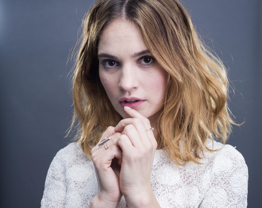 Actress Lily James poses for a portrait in promotion of her new television miniseries "War & Peace," on Wednesday, Jan. 27, 2016, in New York. James also has a role in the new film, "Pride and Prejudice and Zombies," releasing in U.S. theaters on Feb. 5, 2016. (Photo by Scott Gries/Invision/AP)
