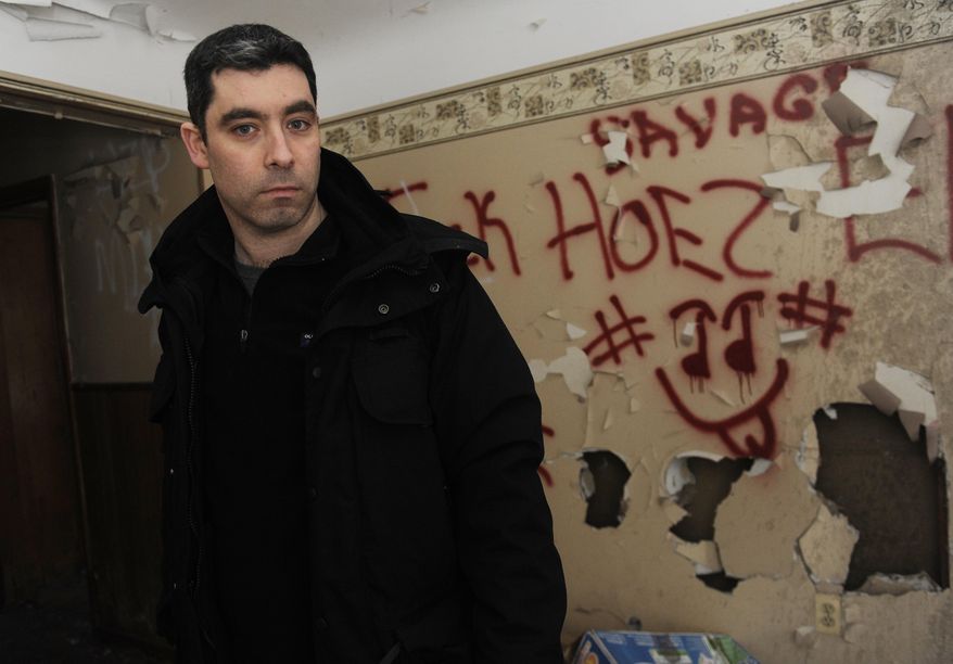 ADVANCE FOR SUNDAY, JAN. 31, 2016 AND THEREAFTER - In this photo taken on Jan. 15, 2016, Michael Matthews stands inside an abandoned house in northeast Detroit. Matthews is a London based cop who is in Detroit doing a book about the Detroit Police Department. Right now, he's embedded with the Gang Unit. (Clarence Tabb Jr., /Detroit News via AP) DETROIT FREE PRESS OUT; HUFFINGTON POST OUT; MANDATORY CREDIT