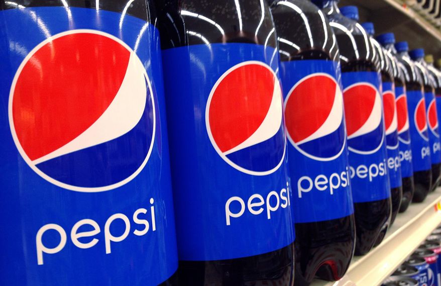 In this July 9, 2015, file photo, Pepsi bottles are on display at a supermarket in Haverhill, Mass. (AP Photo/Elise Amendola, File)