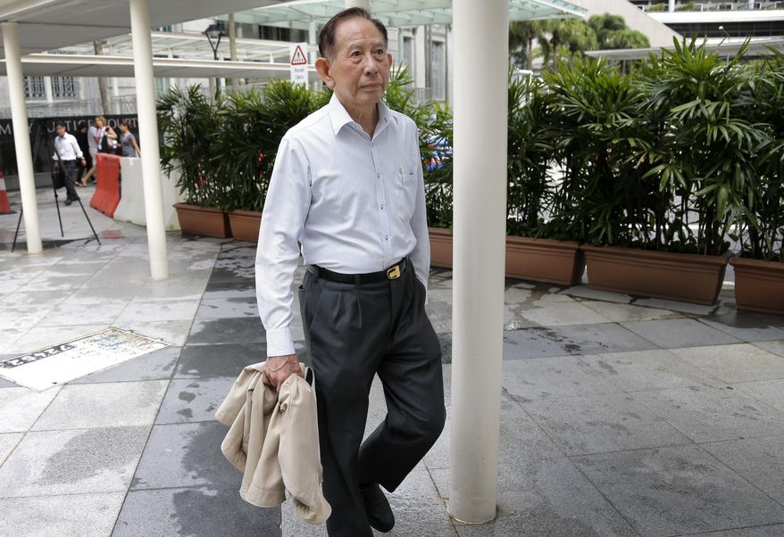 Tan Cheng Hoe, director of a Singapore-registered shipping company, Chinpo, arrives at the State Court on Friday, Jan. 29, 2016, in Singapore. Chinpo was ordered by the State Court to pay close to $127,000 in fines for wiring money used to transport fighter jets and surface-to-air missile systems from Cuba to North Korea in 2013. The haul, hidden under heaps of sugar and discovered by Panamanian authorities, was the biggest load of arms and related materials ever to be intercepted on its way to or from the isolated North. (AP Photo/Wong Maye-E)