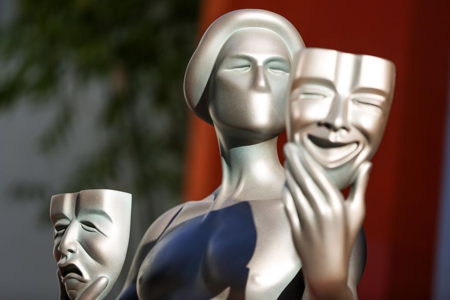 FILE - In a Tuesday, Jan 26, 2016 file photo, a Screen Actors Guild Awards statue for the 22nd Annual Screen Actors Guild Awards is displayed at the TCL Chinese Theatre, in Los Angeles. The awards, to be broadcast live from Los Angeles’ Shrine Auditorium on TNT and TBS on Saturday, Jan. 30 beginning at 8 p.m. EST, come amid uproar over a second straight year of all-white Academy Awards acting nominees. (Photo by Rich Fury/Invision/AP, File)