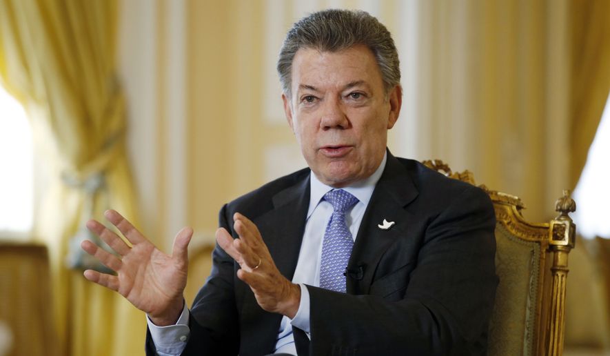 Colombia&#x27;s President Juan Manuel Santos answers a question during an interview at the Presidential Palace in Bogota, Colombia, Thursday, Jan. 28, 2016. (AP Photo/Fernando Vergara)