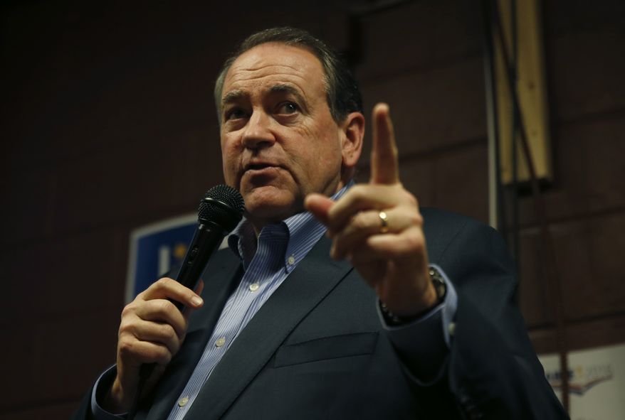 Republican presidential candidate and former Arkansas Gov. Mike Huckabee speaks at Inspired Grounds Cafe in West Des Moines, Iowa, on Jan. 31, 2016. (Associated Press) **FILE**