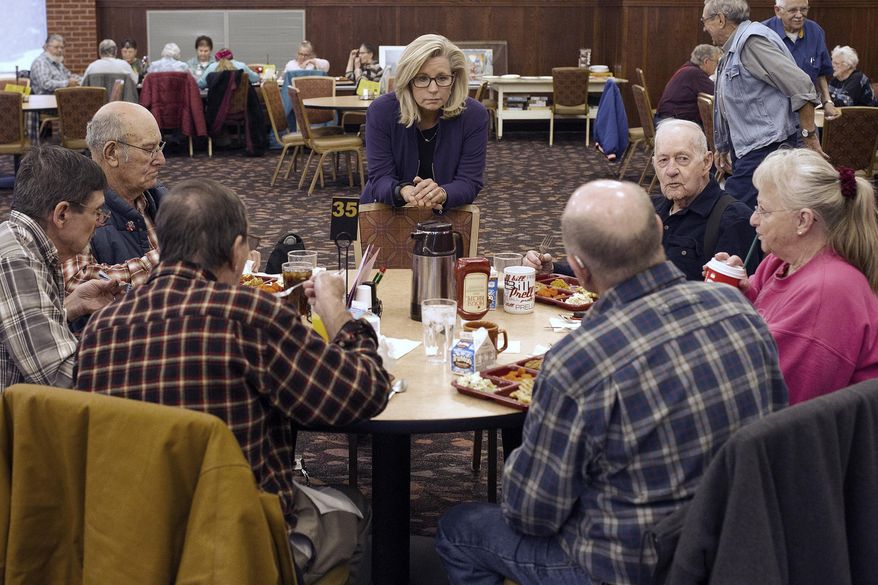 Liz Cheney, center, daughter of former Vice President Dick Cheney, talks to people at the Senior Citizens Center in Gillette, Wyo., on Monday, Feb. 1, 2016. Earlier in the day, she announced her run on the Republican ticket for a seat in the U.S. House of Representatives. (Ed Glazar/Gillette News Record via AP)