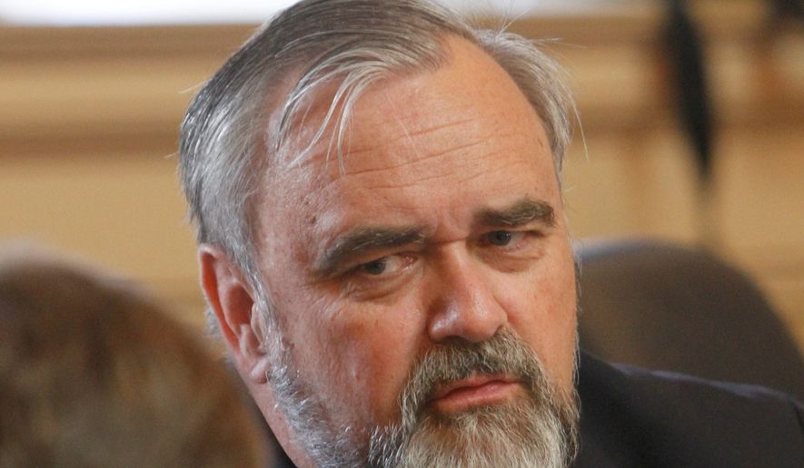 In defending his subcommittee's defeat of five redistricting bills, Delegate Mark Cole, Spotsylvania Republican, said the proposals were premature. (Associated Press)