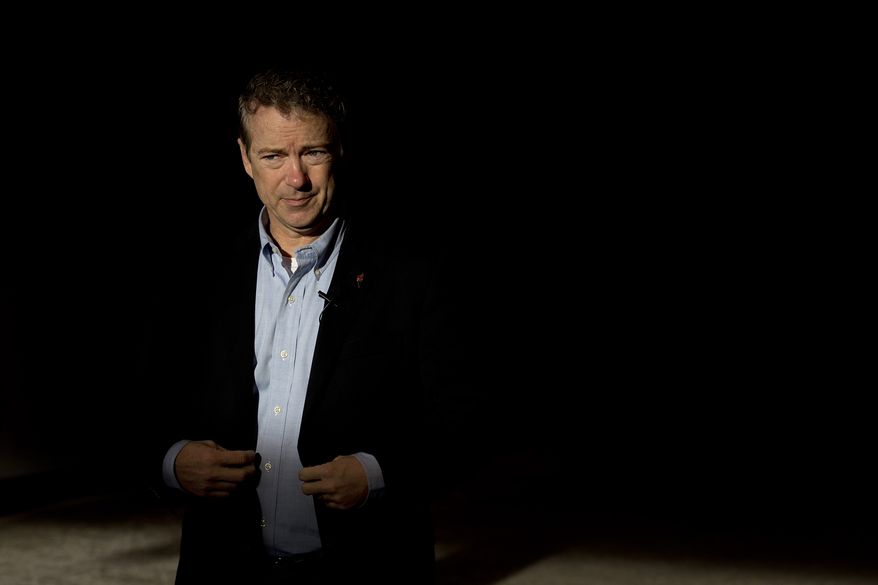 Republican presidential candidate, Sen. Rand Paul, R-Ky., arrives at the Mid-America Center to attend a rally Saturday, Jan. 30, 2016, in Council Bluffs, Iowa. (AP Photo/Jae C. Hong)
