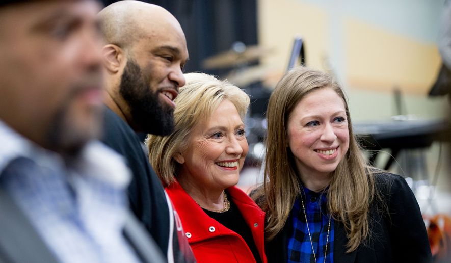 Democratic presidential candidate Hillary Clinton and daughter Chelsea attended Iowa&#x27;s African-American Festival, I&#x27;ll Make Me a World Celebration Day, last month before the nominating contests began. (Associated Press)