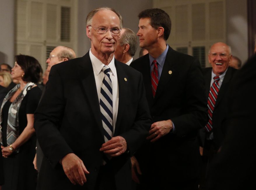 Alabama Gov. Robert Bentley walks towards the door after speaking during the annual State of the State address at the Capitol, Tuesday, Feb. 2, 2016, in Montgomery, Ala. (AP Photo/Brynn Anderson)