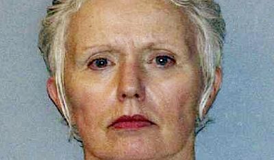 FILE - This undated file photo provided by the U.S. Marshals Service shows Catherine Greig, longtime girlfriend of Whitey Bulger, who was captured with Bulger in 2011 in Santa Monica, Calif. Greig already is serving an eight-year prison term for helping Bulger avoid capture. She is expected to plead guilty in federal court in Boston Wednesday, Feb. 3, 2016, to a criminal contempt charge for refusing to testify before a grand jury investigating whether other people helped Bulger during his 16 years on the run. (AP Photo/U.S. Marshals Service, File)