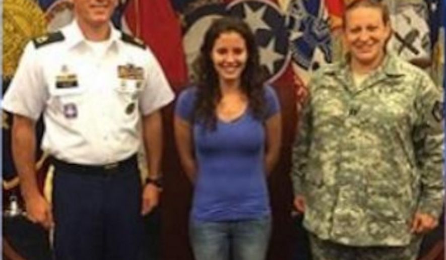 Erika Lopez (center) was the fourth woman in the country to enlist as a combat engineer in the U.S. Army (Image: local8now.com)