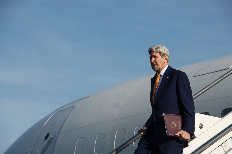 U.S. Secretary of State John Kerry gets off his plane upon his arrival at Rome's Ciampino airport Monday, Feb. 1, 2016. Kerry will be in Rome for a meeting of the core countries of the U.S.-led military coalition fighting the IS group, and will then travel to London for a conference of donors to the humanitarian effort in Syria. (Nicholas Kamm/Pool Photo via AP)