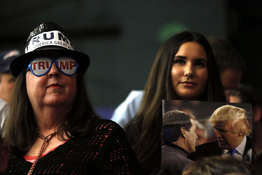 Attendees listen to Republican presidential candidate Donald Trump speak during a campaign stop Tuesday, Feb. 2, 2016, in Milford, N.H. (AP Photo/Matt Rourke)