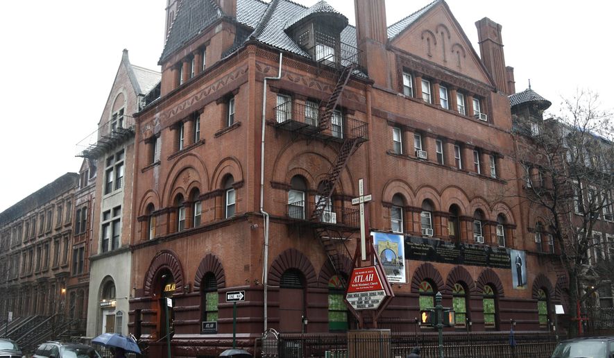 The outside of the Atlah Church is seen in the Harlem section of New York, Wednesday, Feb. 3, 2016. Two groups that serve gay New Yorkers are hoping to get the last word on the Atlah World Missionary Church. They want to buy its headquarters at a foreclosure auction. One wants to turn it into housing for gay homeless youth. (AP Photo/Seth Wenig)
