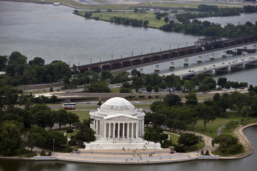 FILE - In this June 2, 2013 file photo, the Jefferson Memorial is seen from the Washington Monument in Washington. As the National Park Service celebrates its 100th anniversary, it faces billions of dollars in delayed maintenance for projects ranging from replacing water works at the Grand Canyon to making sure the Jefferson Memorial doesn’t sink into the Tidal Basin. (AP Photo/Alex Brandon, File)