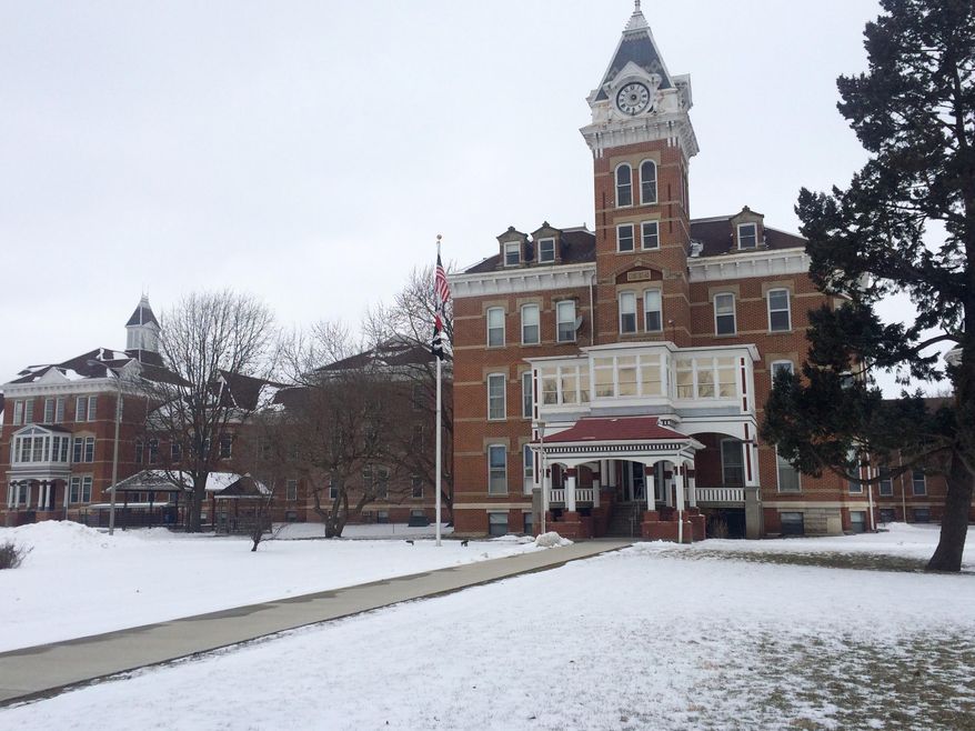 This Jan. 26, 2016 photo shows the Clarinda Mental Health Institute in Clarinda, Iowa. Community members have been working to find occupants for the former hospital but the process hasn't proved to be an easy one as unclaimed inventory piles up and a historic part of the town remains largely empty. (AP Photo/Aleksandra Vujicic)