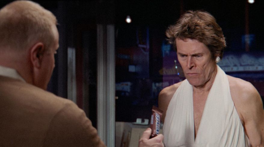This photo provided by Mars Chocolate North America shows actor Willem Dafoe in a scene from a Snickers Super Bowl 50 spot. Super Bowl 50, between the Denver Broncos and the Carolina Panthers, will be played Sunday, Feb. 7, 2016. (Mars Chocolate North America via AP)