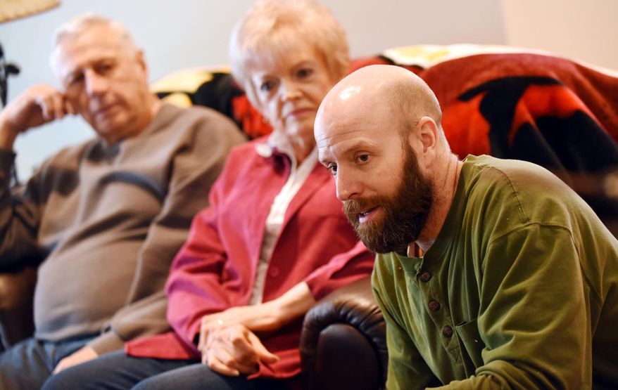 In this Jan. 25, 2016 photo, sitting around the living room, Tyson Niewoehner tells some of the story of his kidney transplant as his wife's parents, Dick and Lillian Levi listen in Bigfork, Mont. In November Tyson gave Shelley, his wife, one of his kidneys. (Brenda Ahearn/The Daily Inter Lake via AP) MANDATORY CREDIT
