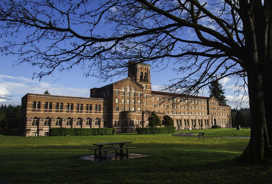 This photo taken on Jan. 28, 2016, shows the exterior of the 1931 seminary building at Saint Edward State Park, in Kenmore, Wash. When developer Kevin Daniels announced plans in August to renovate the badly deteriorated 1931 seminary building and turn it into a hotel and spa, he said he knew it would involve a lengthy public process and outspoken neighbors who love their park the way it is. Half a year later, Daniels says he’s gotten enthusiastic feedback from many in the community and expressions of interest from potential hotel operators. (Mike Siegel/The Seattle Times via AP) SEATTLE OUT; USA TODAY OUT; MAGS OUT; TELEVISION OUT; NO SALES; MANDATORY CREDIT TO BOTH THE SEATTLE TIMES AND THE PHOTOGRAPHER