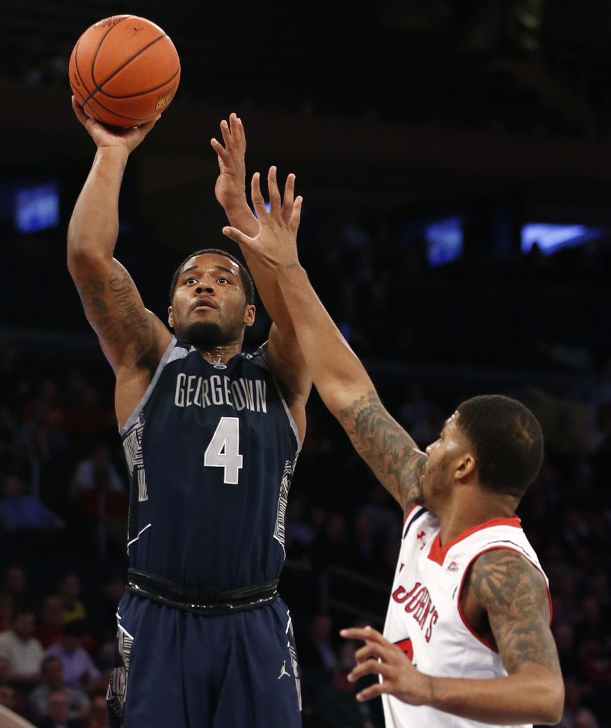 Georgetown guard D&#x27;Vauntes Smith-Rivera (4) scored 24 points in the Hoyas&#x27; 92-67 win over St. John&#x27;s on Monday night. (Associated Press) **FILE**