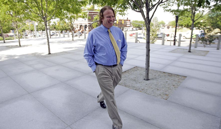 FILE- This June 30, 2015, file photo, Jeremy Johnson arrives at federal court, in Salt Lake City. Johnson who was a key figure in an influence-peddling scandal that ensured two former attorneys general is expected to be his own attorney in a trial that starts Monday. Johnson is facing allegations that he set up a series of straw companies to make millions of dollars in fraudulent credit card charges. (AP Photo/Rick Bowmer, File)
