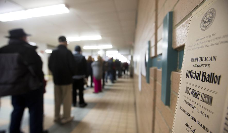 A ballot is posted to the wall as voters wait in line to cast their ballots for the New Hampshire primary at a polling place Tuesday, Feb. 9, 2016, in Manchester, N.H. (AP Photo/David Goldman)