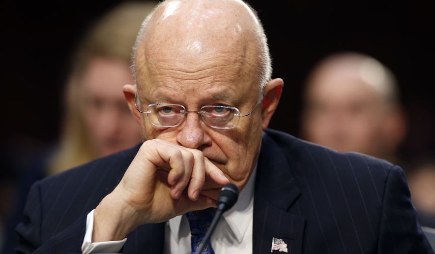 Director of the National Intelligence James Clapper participates in the Senate Intelligence Committee&#39;s hearing on worldwide threats, Tuesday, Feb. 9, 2016, on Capitol Hill in Washington. (AP Photo/Alex Brandon) ** FILE **