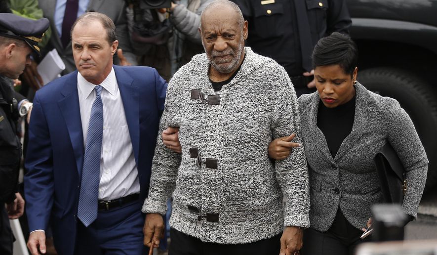 FILE - In this Dec. 30, 2015 file photo Bill Cosby, center, accompanied by his attorneys Brian McMonagle, left, and Monique Pressley, arrives at court to face a felony charge of aggravated indecent assault, in Elkins Park, Pa. A Los Angeles judge on Tuesday, Feb. 9, 2016, dismissed Cosby's former attorney Martin Singer from a defamation lawsuit filed by model Janice Dickinson over denials of her allegations the comedian drugged and raped her in Lake Tahoe, Calif., in 1982. (AP Photo/Matt Rourke, File)