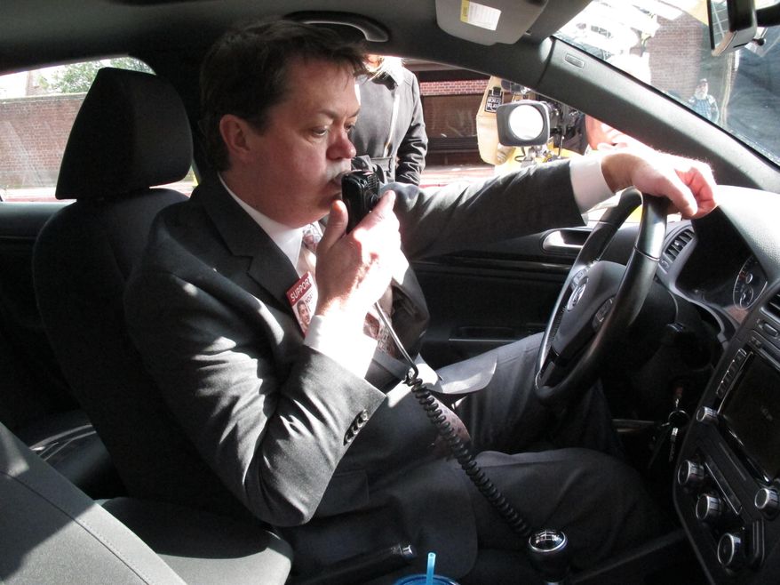 Andrew Wisniewski, an operations manager for Smart Start of Maryland, demonstrates how an ignition interlock device works on Wednesday, Feb. 10, 2016 in Annapolis, Maryland. The devices are put in cars to stop drunk drivers from operating their vehicles. Maryland lawmakers want to require the devices for first-time offenders, rather than just ones arrested with more than twice the legal limit of alcohol in their systems. (AP Photo/Brian Witte)