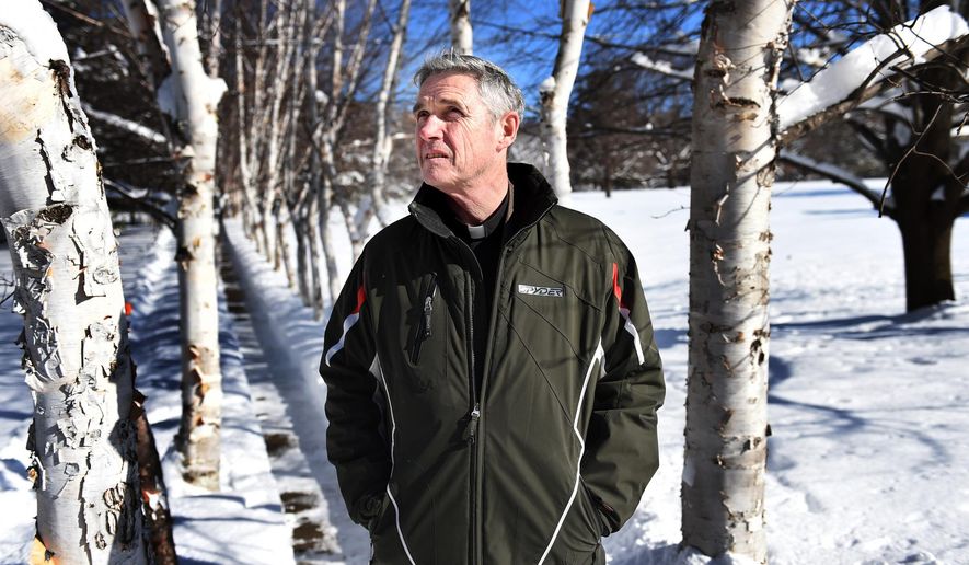 ADVANCE FOR SATURDAY, FEB. 13, 2016 AND THEREAFTER - In this photo taken on Feb. 3, 2016, The Rev. Patrick McCorkell, who is the house director at the Demontreville Jesuit Retreat House, poses in Lake Elmo, Minn. Each weekend, as many as 70 men gather at there in silent retreat for three days of prayer and meditation. Conducted by the Jesuit order of the Roman Catholic Church, the retreats have been held since 1948. Some 3,000 men take part each year. From Thursday night to Sunday, they devote their time to meditation, prayer and spiritual exercises based on the writings of St. Ignatius, the 16th century Spanish priest who founded the Jesuits. Other hours are spent reading, in private religious devotion or hiking through the retreat’s 100 acres. (Jean Pieri /Pioneer Press via AP) MINNEAPOLIS STAR TRIBUNE OUT; MANDATORY CREDIT